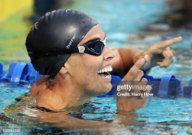 Amanda Beard celebrates a second place finish in the Women 200 LC Breaststroke Final during the 2010 ConocoPhillips National Championships at the...