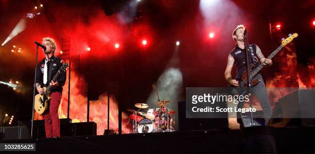 Mike Dirnt, Tre Cool and Billie Joe Armstrong of Green Day perform during the 2010 Lollapalooza festival in Grant Park on August 7, 2010 in Chicago,...