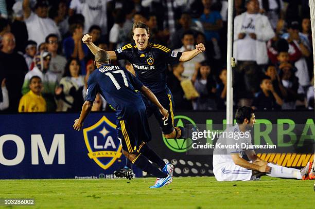 Todd Dunivant of Los Angeles Galaxy celebrates his goal against Real Madrid with teammate Tristan Bowen during their pre-season friendly soccer match...