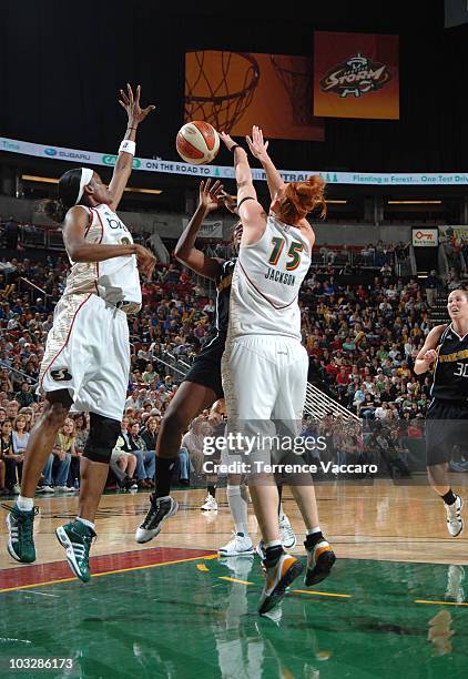 Lauren Jackson of the Seattle Storm blocks a shot attempt made by Amber Holt of the Tulsa Shock on August 7, 2010 at Key Arena in Seattle,...