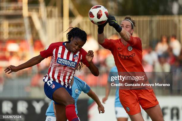 Goalkeeper Karen Bardsley of Manchester City stops the header of Ludmila Da Silva of Atletico de Madrid during the UEFA Women Champions League Round...