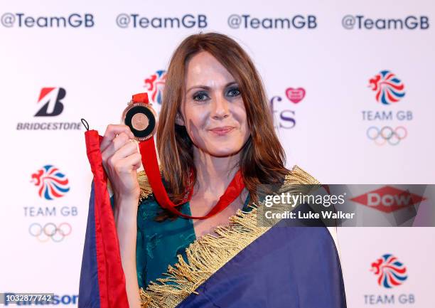 Team GB heptathlete Kelly Sotherton receives her bronze medal from the 2008 Olympics attends The Team GB Ball 2018 held at The Royal Horticultural...