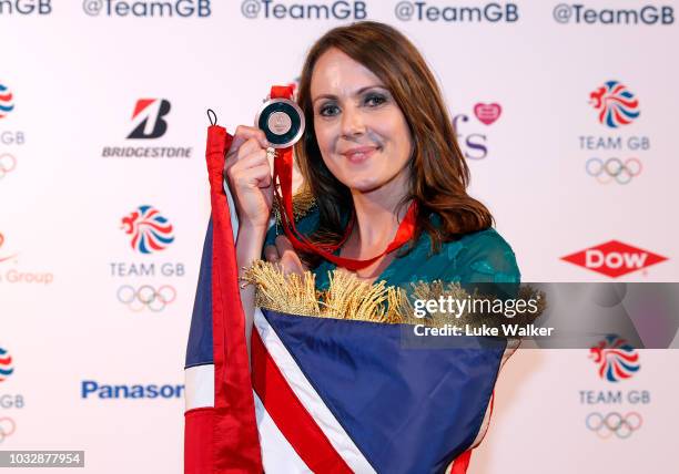 Team GB heptathlete Kelly Sotherton receives her bronze medal from the 2008 Olympics attends The Team GB Ball 2018 held at The Royal Horticultural...