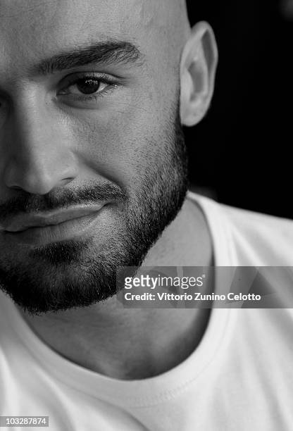 Image has been converted to black and white.) Actor Francois Sagat attends "Homme Au Bain" photocall during the 63rd Locarno Film Festival on August...