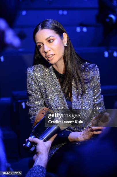 Ahu Yagtu attends the Mercedes-Benz Istanbul Fashion Week at Zorlu Center on September 13, 2018 in Istanbul, Turkey.