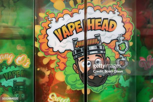 Liquids, which are used for vaping in electronic cigarettes, are offered for sale at the Smoke Depot on September 13, 2018 in Chicago, Illinois. The...