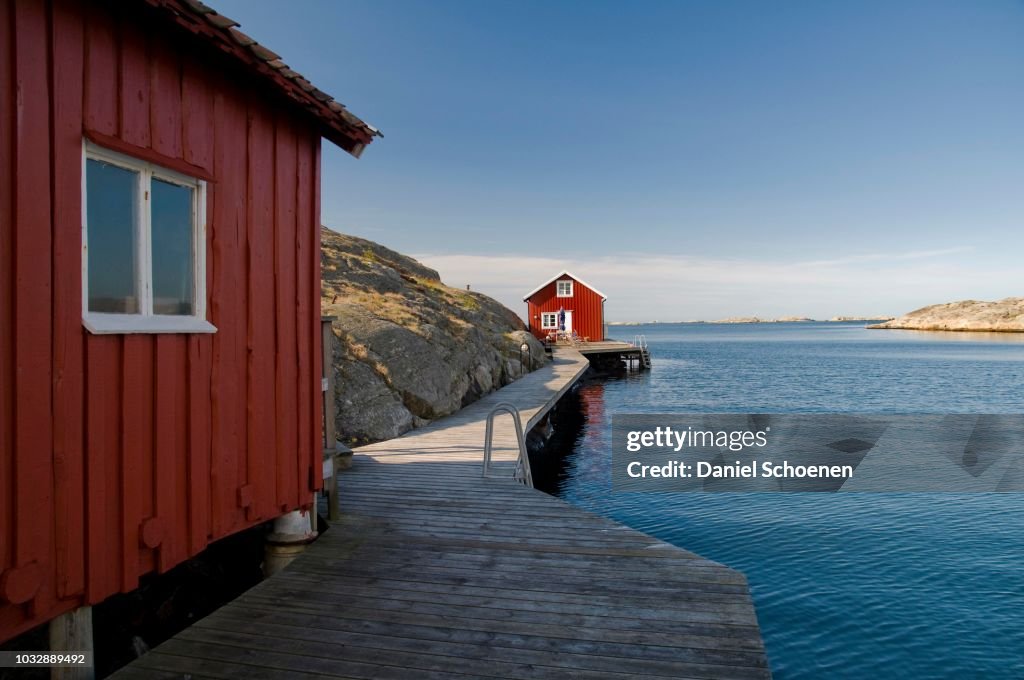 Red, wooden houses by the sea, Smoegen, Bohuslaen, Sweden, Scandinavia