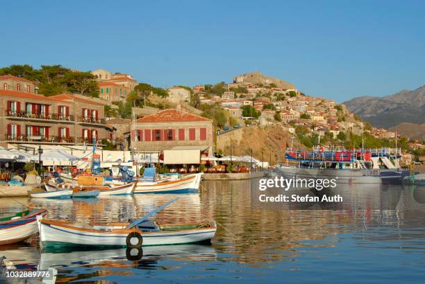 port with fishing boats and historic town centre with castle, mithymna, molyvos or molivos, lesbos island, aegean sea, greece - lesbos stock pictures, royalty-free photos & images