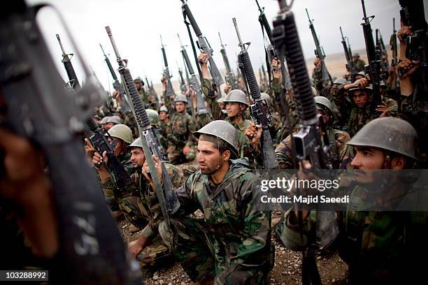 Afghan National Army recruits take part in a training exercise, on August 8, 2010 in Kabul, Afghanistan. Reports suggest that the US are keen to...