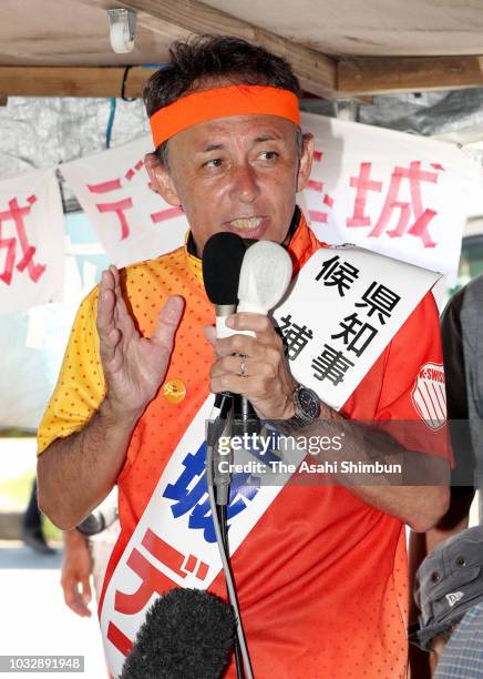 Opposition 'All Okinawa' movement backed candidate Denny Tamaki visits a hut set up by anti-U.S. Airbase relocation protesters as the Okinawa...