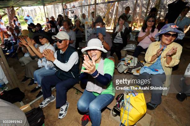 Supporters of opposition 'All Okinawa' movement backed candidate Denny Tamaki visits a hut set up by anti-U.S. Airbase relocation protesters as the...