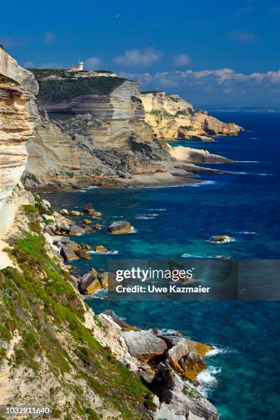 rugged chalk cliffs and turquoise blue sea, cliffs, bonifacio, corsica, france - corsica beach stock pictures, royalty-free photos & images