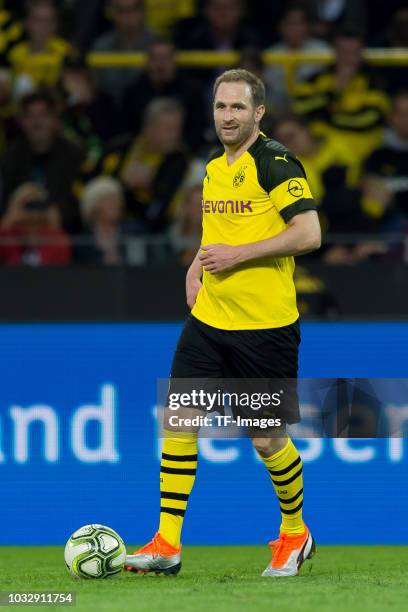 Florian Kringe of Borussia Dortmund Allstars controls the ball during the Roman Weidenfeller Farewell Match between BVB Allstars and Roman and...