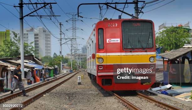 jakarta commuter line train - jakarta slum stock pictures, royalty-free photos & images