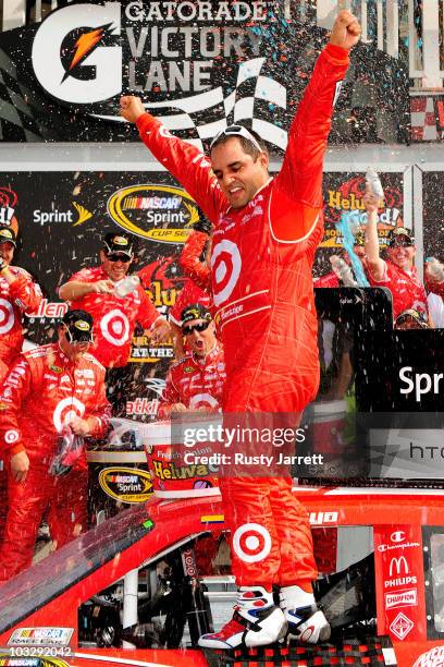 Juan Pablo Montoya, driver of the Target Chevrolet, celebrates after winning the NASCAR Sprint Cup Series Heluva Good! Sour Cream Dips at Watkins...