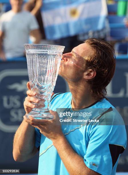 David Nalbandian of Argentina celebrates after defeating Marcos Baghdatis of Cyprus during the singles final on day 7 of the Legg Mason Tennis...