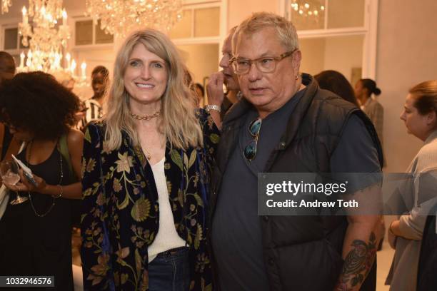 Becky Mick and BCBG President Marty Staff attend the celebration of the BCBGMAXAZRIA SoHo store opening with Kate Young, Bernd Kroeber and InStyle on...