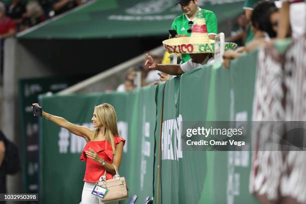 Mexican journalist, Ines Sainz poses for a selfie prior the friendly match between Mexico and Uruguay at NRG Stadium on September 7, 2018 in Houston,...