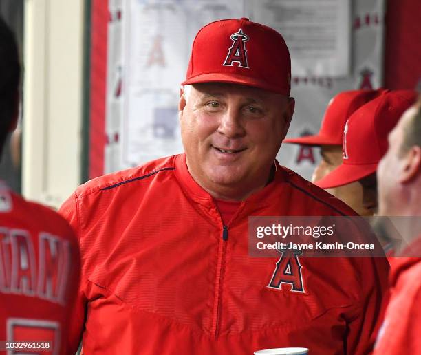 Manager Mike Scioscia of the Los Angeles Angels of Anaheim in the dugout during the game against the Seattle Mariners at Angel Stadium on September...