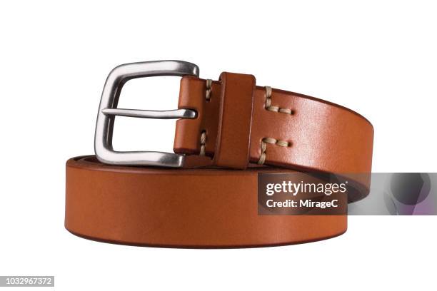 rolled up brown belt - ceintuur stockfoto's en -beelden