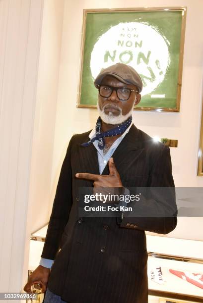 Actor Eriq Ebouaney attends the Christian Dior Cocktail as part of 'Promenade Pour Un Objet D' Exception' Hosted By Comite Montaigne At Avenue...