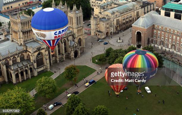 Hot air balloon flies above Bristol city centre on August 9, 2010 in Bristol, England. The dawn flight was a preview for the International Balloon...