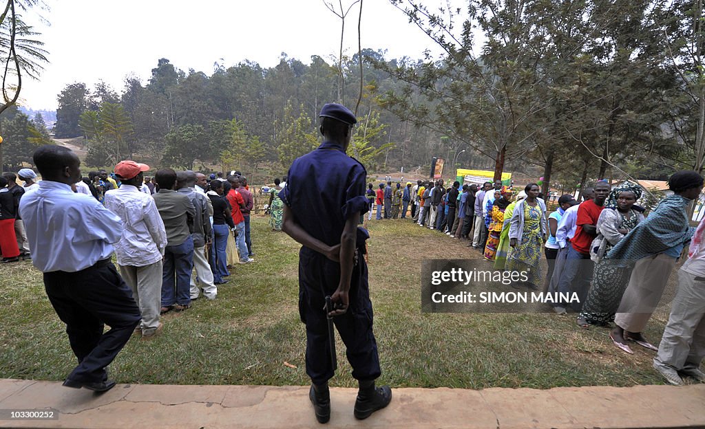 Voters wait in line outside Rugunga poll