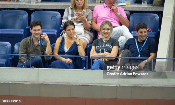 Justin Bartha, Lia Smith, Jenny Mollen, Jason Biggs at Day 12 of the US Open held at the USTA Tennis Center on September 7, 2018 in New York City.