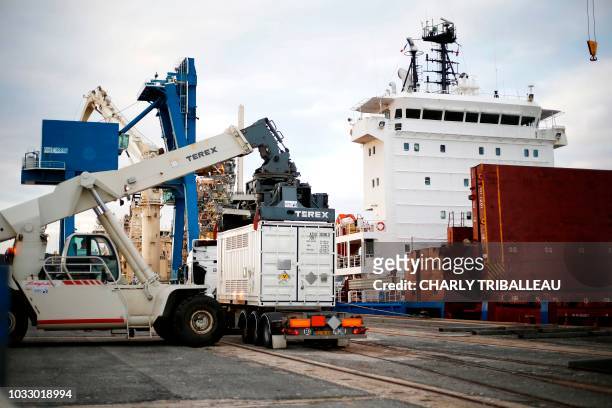 Container with irradiated nuclear fuel from Australia is discharged from the BBC Austria ship, on September 14, 2018 at the port of...