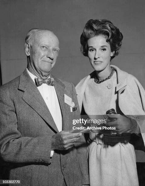 American socialite Babe Paley presents Joseph E. Ridder with the President's Gavel at the Annual Meeting of the Trustees of North Shore Hospital,...