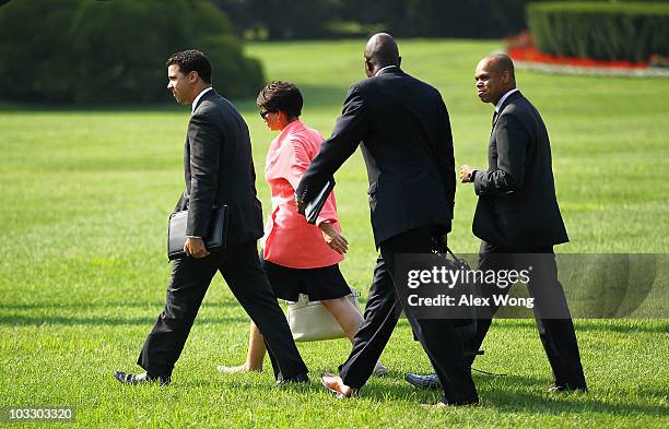 Deputy White House Press Secretary Bill Burton, White House Senior Adviser Valerie Jarrett, special assistant and personal aide Reggie Love, and...