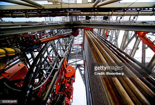 The derrick rises from the floor of the Transocean Ltd. Development Driller II rig, which is drilling a relief well at the BP Plc Macondo site in the...