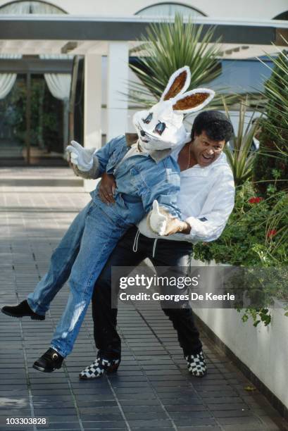 American singer-songwriter Chubby Checker with Jive Bunny, circa 1989. Jive Bunny & The Mastermixers had produced a version of Checker's song 'The...