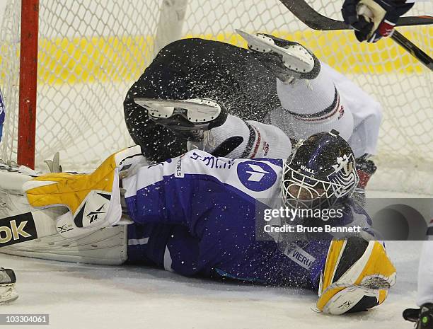 Brandon Saad of Team USA flies over Jonathan Iilahti of Team Finland at the USA Hockey National Evaluation Camp on August 4, 2010 in Lake Placid, New...