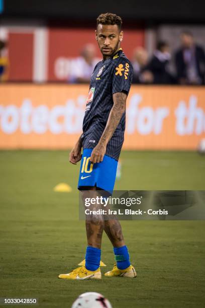 Neymar of Brazil warms up prior to the friendly match between Brazil and the United States at MetLife Stadium on September 07, 2018 in East...