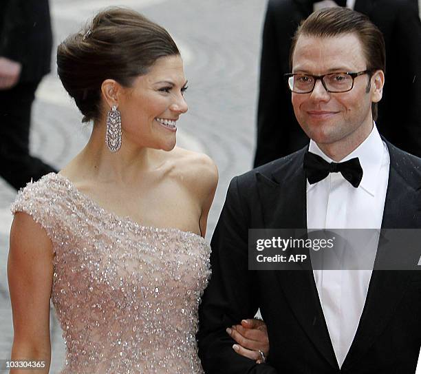 Sweden's Crown Princess Victoria and Daniel Westling arrive for a gala performance at the Stockholm Concert Hall in Stockholm on June 18 at the start...