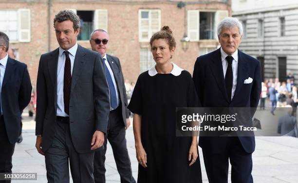 Giovanni Gaetani dell'Aquila d'Aragona, Ginevra Elkann and Alain Elkann arrive at the memorial service for Sergio Marchionne at Duomo on September...