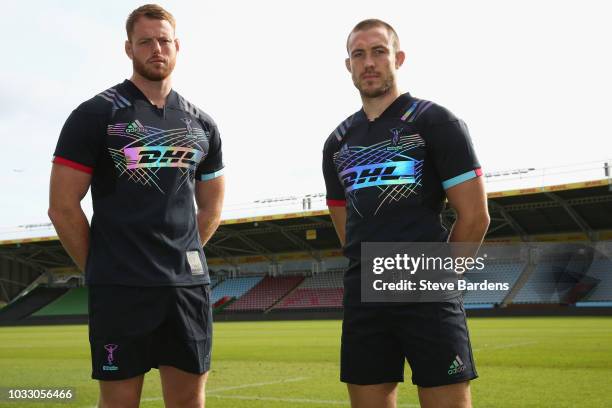 Mike Brown and George Merrick of Harlequins pose wearing the new Harlequins 2018/19 Charity Jersey Quintessential Flash at Twickenham Stoop on...