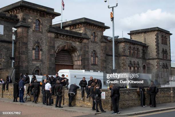 Prison staff at H.M.P Wandsworth gather outside after staging a 'walk-out' on September 14, 2018 in London, England. The Prison Officers Association...