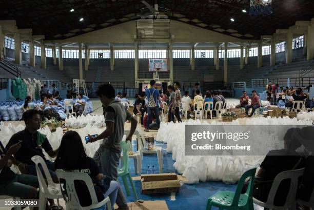 Bags of relief supplies sit at a makeshift disaster relief operations center ahead of Typhoon Mangkhut's arrival in Tuguegarao, Cagayan province, the...