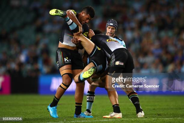 Kurt Dillon of the Sharks of the Sharks is tackled during the NRL Semi Final match between the Cronulla Sharks and the Penrith Panthers at Allianz...