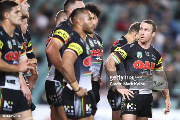 James Maloney of the Panthers and his team mates look dejected after a Sharks try during the NRL Semi Final match between the Cronulla Sharks and the...