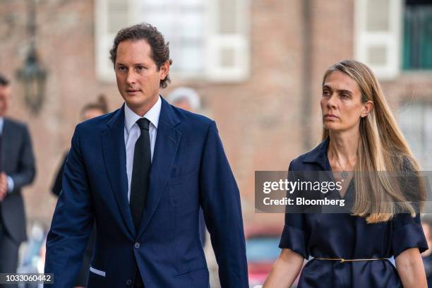 John Elkann, chairman of Fiat Chrysler Automobiles NV, left, and his wife Lavinia Borromeo, arrive for a memorial service for former Fiat Chrysler...