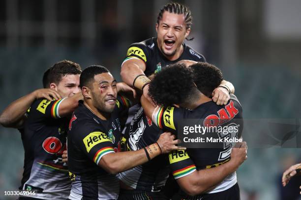 The Panthers celebrate Waqa Blake scoring a try during the NRL Semi Final match between the Cronulla Sharks and the Penrith Panthers at Allianz...
