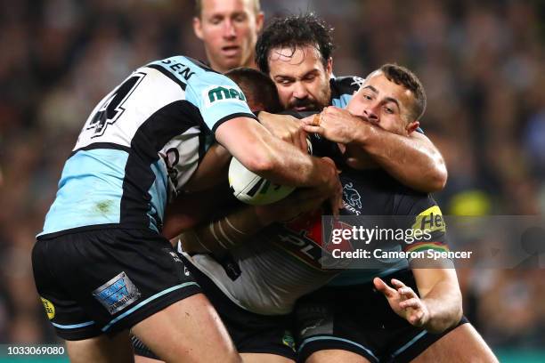 Reagan Campbell-Gillard of the Panthers is tackled during the NRL Semi Final match between the Cronulla Sharks and the Penrith Panthers at Allianz...