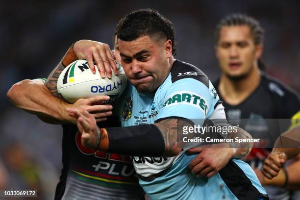 Andrew Fifita of the Sharks is tackled during the NRL Semi Final match between the Cronulla Sharks and the Penrith Panthers at Allianz Stadium on...