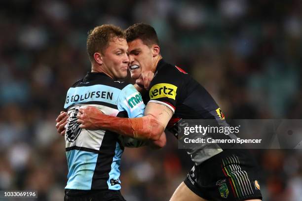 Matthew Moylan of the Sharks is tackled by Nathan Cleary of the Panthers during the NRL Semi Final match between the Cronulla Sharks and the Penrith...