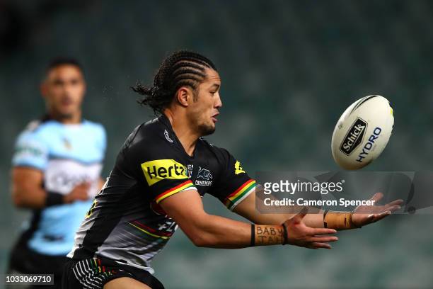 Corey Harawira-Naera of the Panthers juggles the ball during the NRL Semi Final match between the Cronulla Sharks and the Penrith Panthers at Allianz...