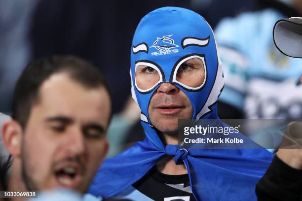 Sharks supporter watches on during the NRL Semi Final match between the Cronulla Sharks and the Penrith Panthers at Allianz Stadium on September 14,...