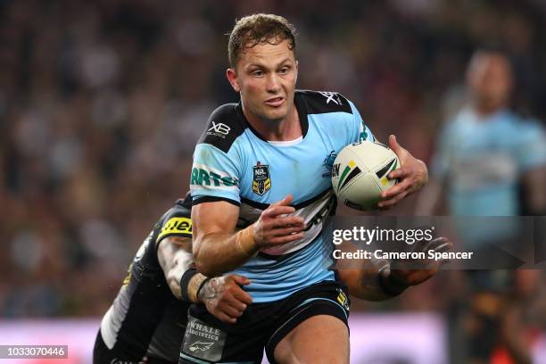 Matthew Moylan of the Sharks runs the ball during the NRL Semi Final match between the Cronulla Sharks and the Penrith Panthers at Allianz Stadium on...